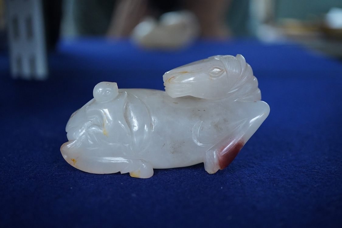 A Chinese agate carving of a horse and monkey, 8cm wide